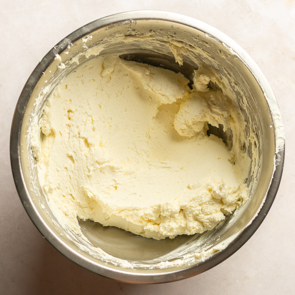 whipped cream cheese and mascarpone cheese in a stainless bowl.