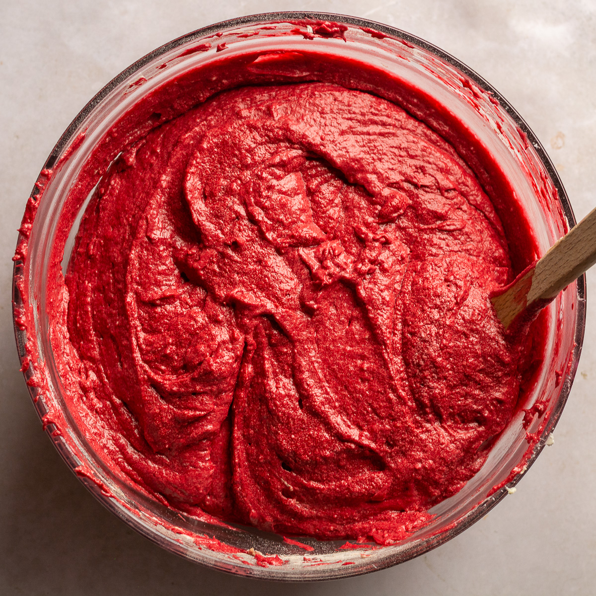 red velvet cake batter in a glass bowl.