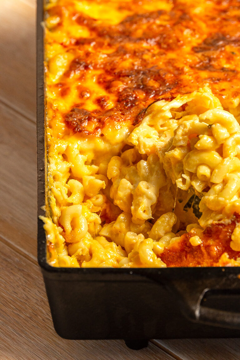 old-fashioned mac and cheese in a cast-iron casserole dish.