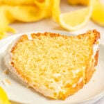 slice of lemon yogurt bundt cake on a plate.