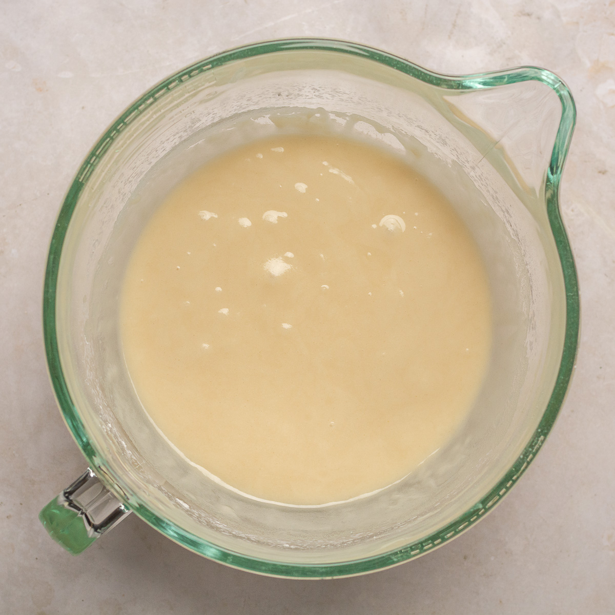 dry ingredients beat with oil in a glass bowl.