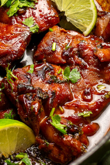 cilantro lime chicken thighs in a pan.