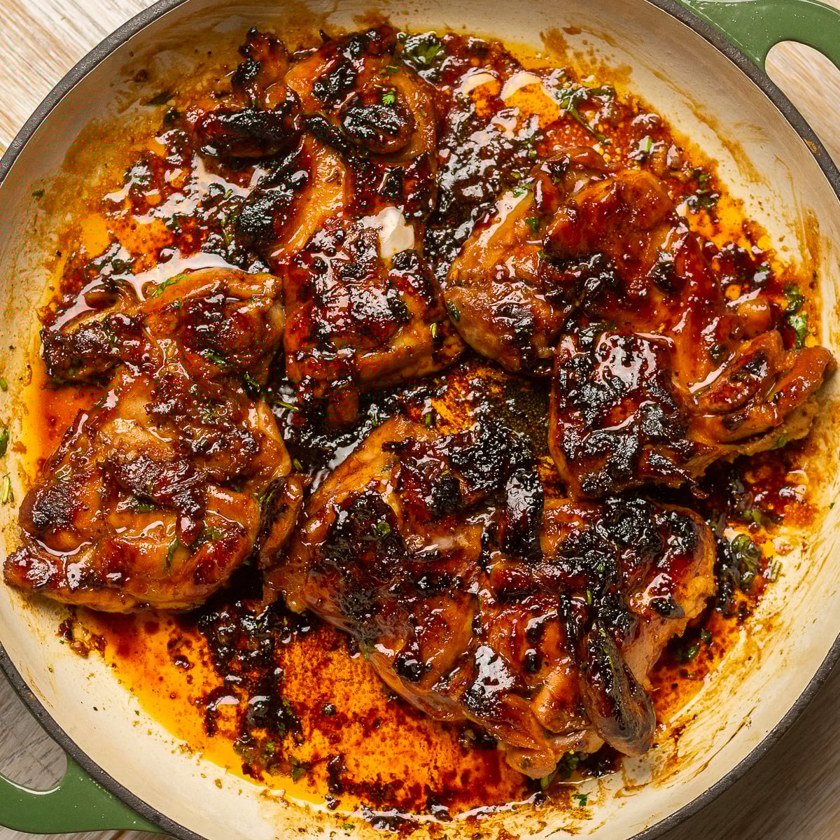 cilantro lime chicken thighs seared in a pan.