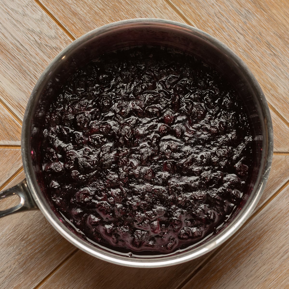 blueberry compote in a saucepan.