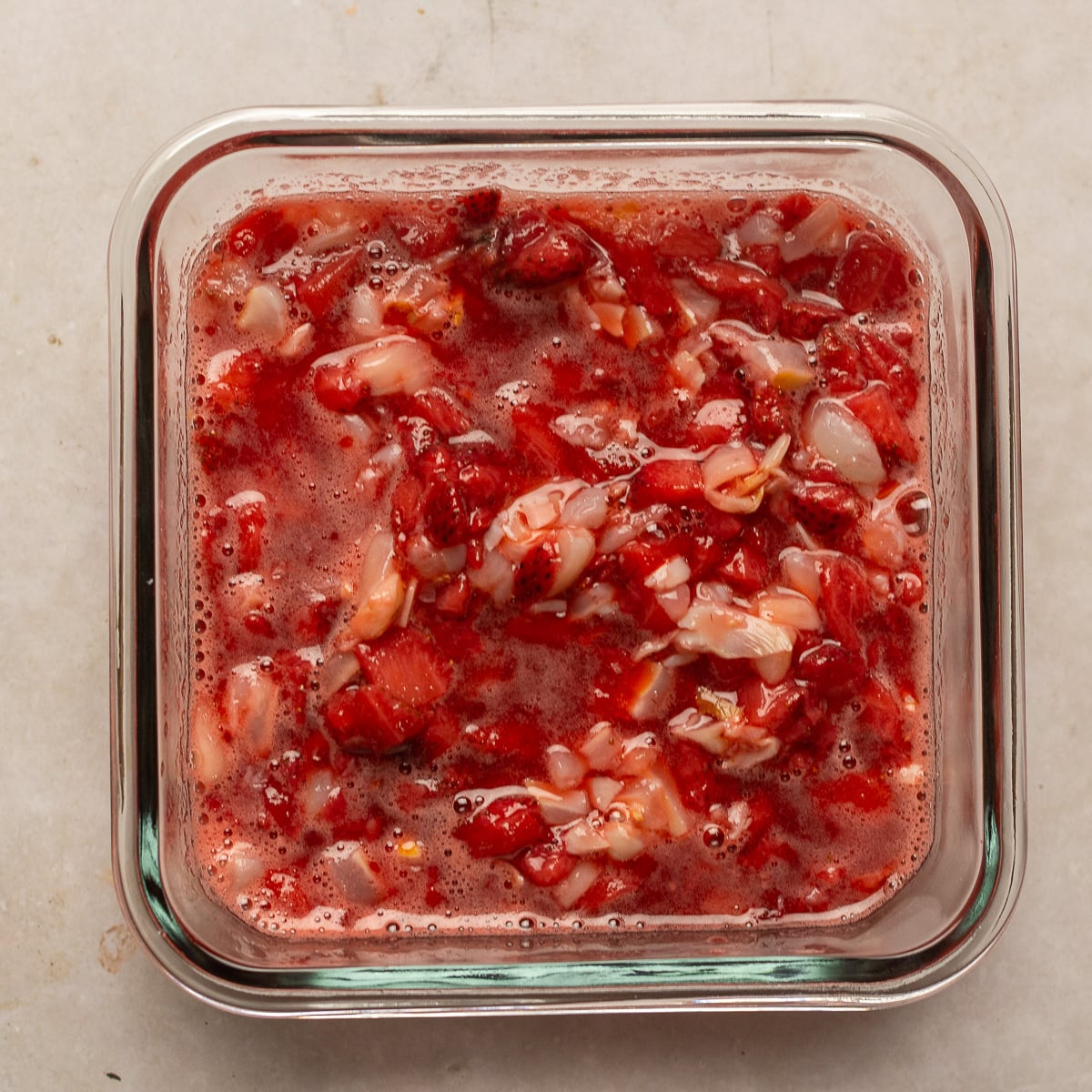 strawberry lychee filling in a glass container.