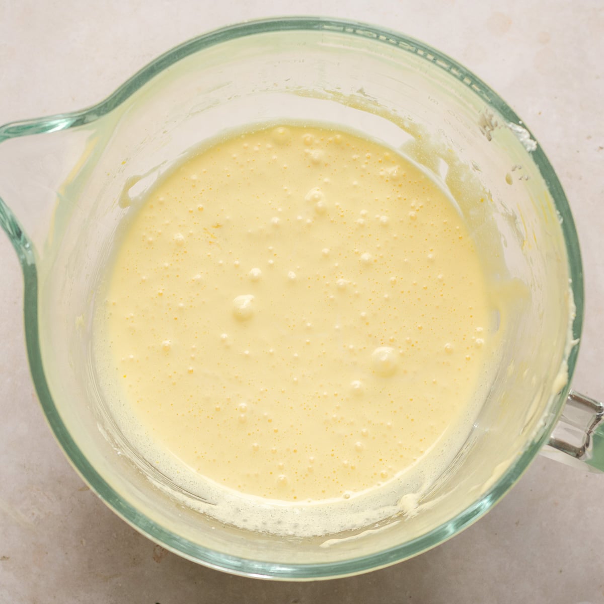 egg yolks and oil added to whipped egg whites.
