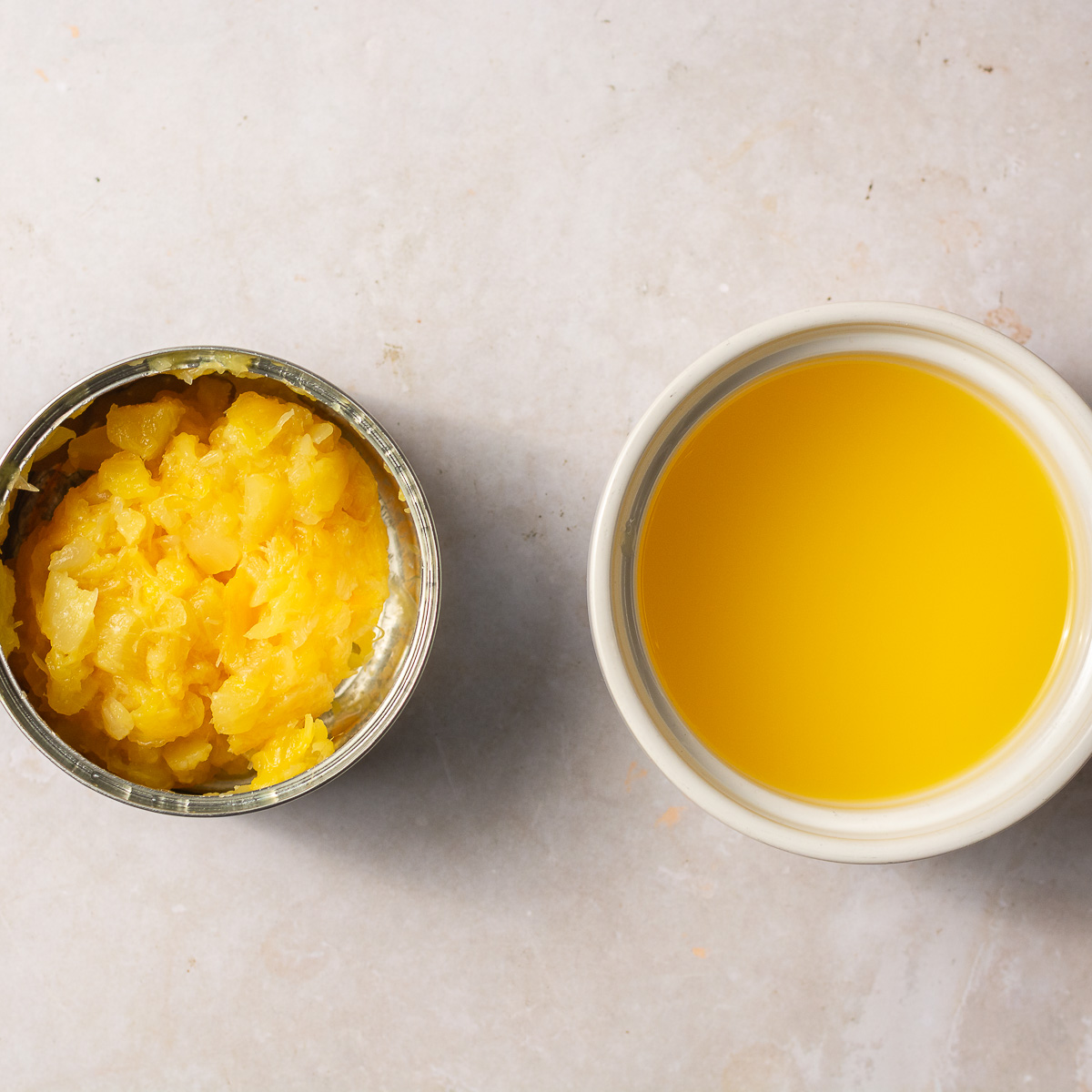 can of drained crushed pineapples and bowl of pineapple juice.