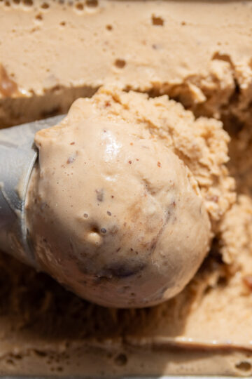 ice cream scoop with butter pecan ice cream.