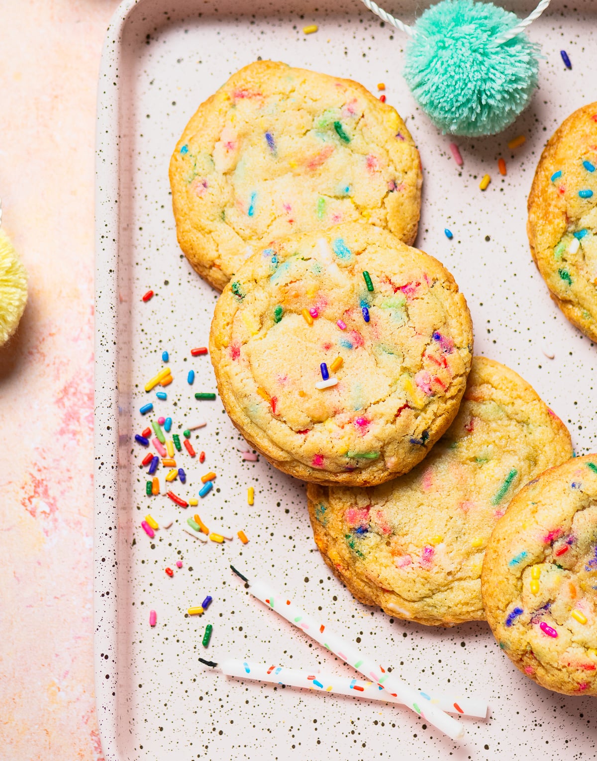 confetti cookies on a baking tray.