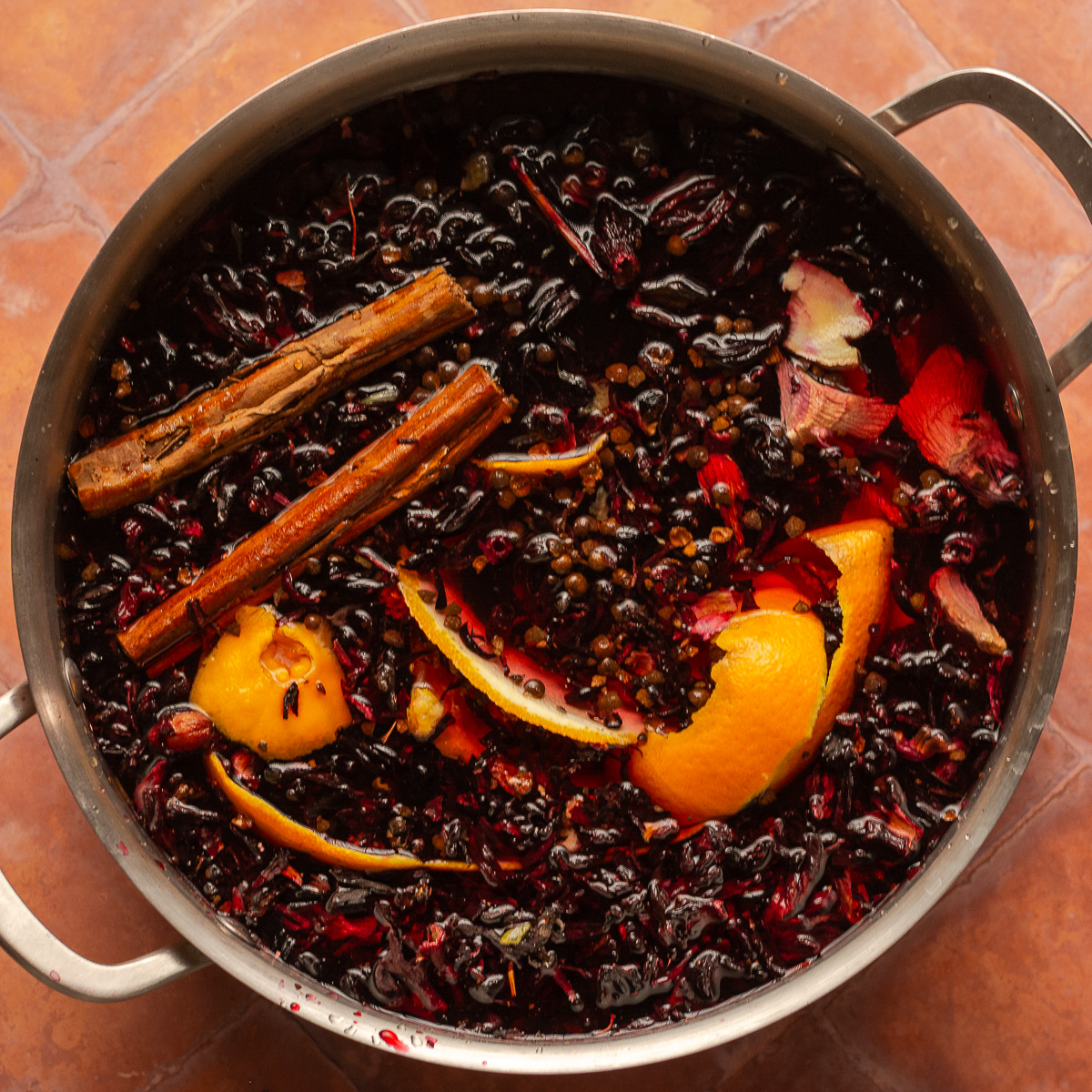 ingredients for Jamaican sorrel in a stockpot.
